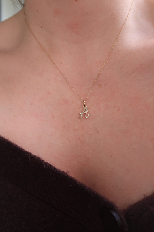 The Cursive Diamond Initial