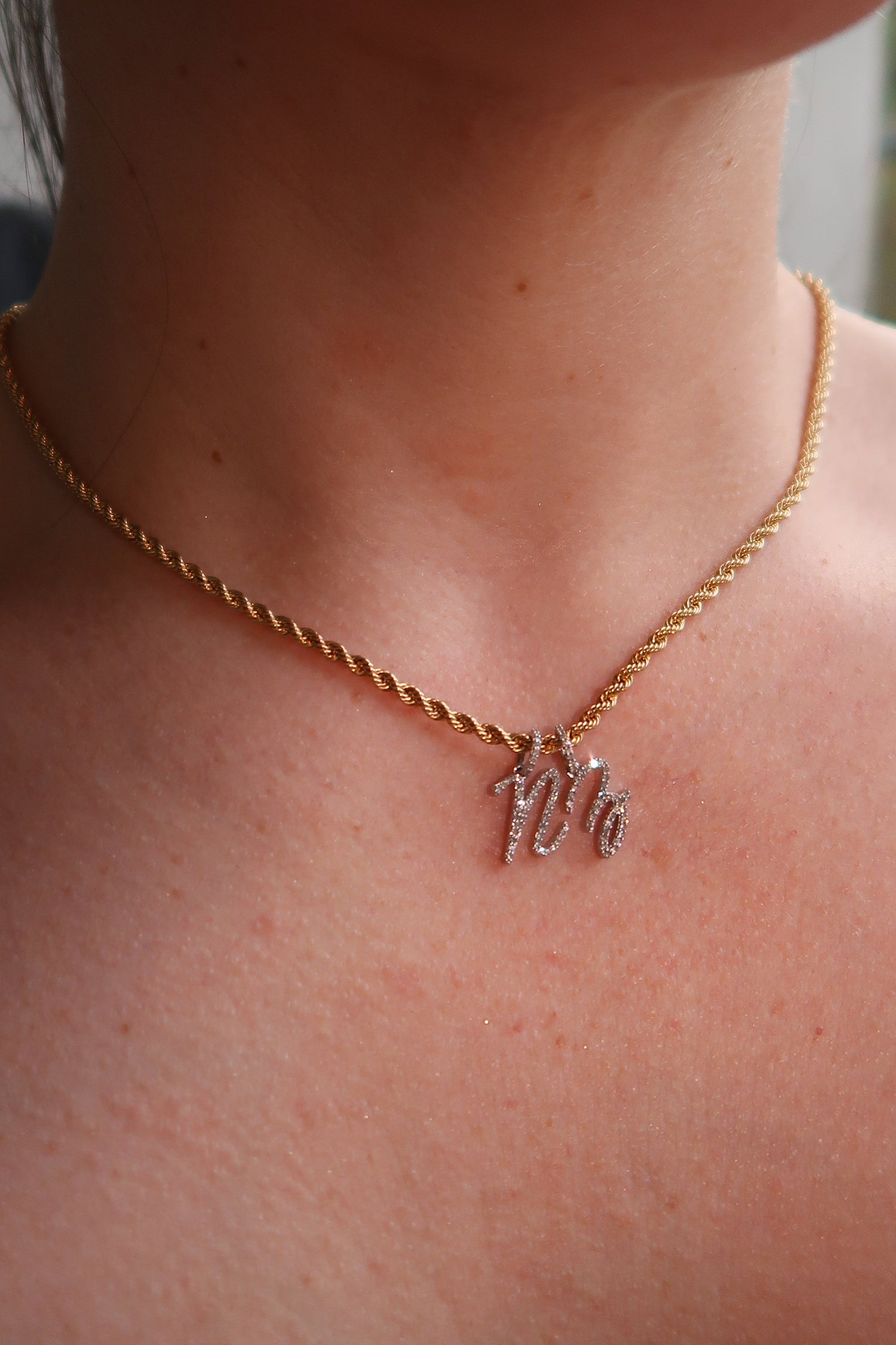 The Cursive Diamond Initial