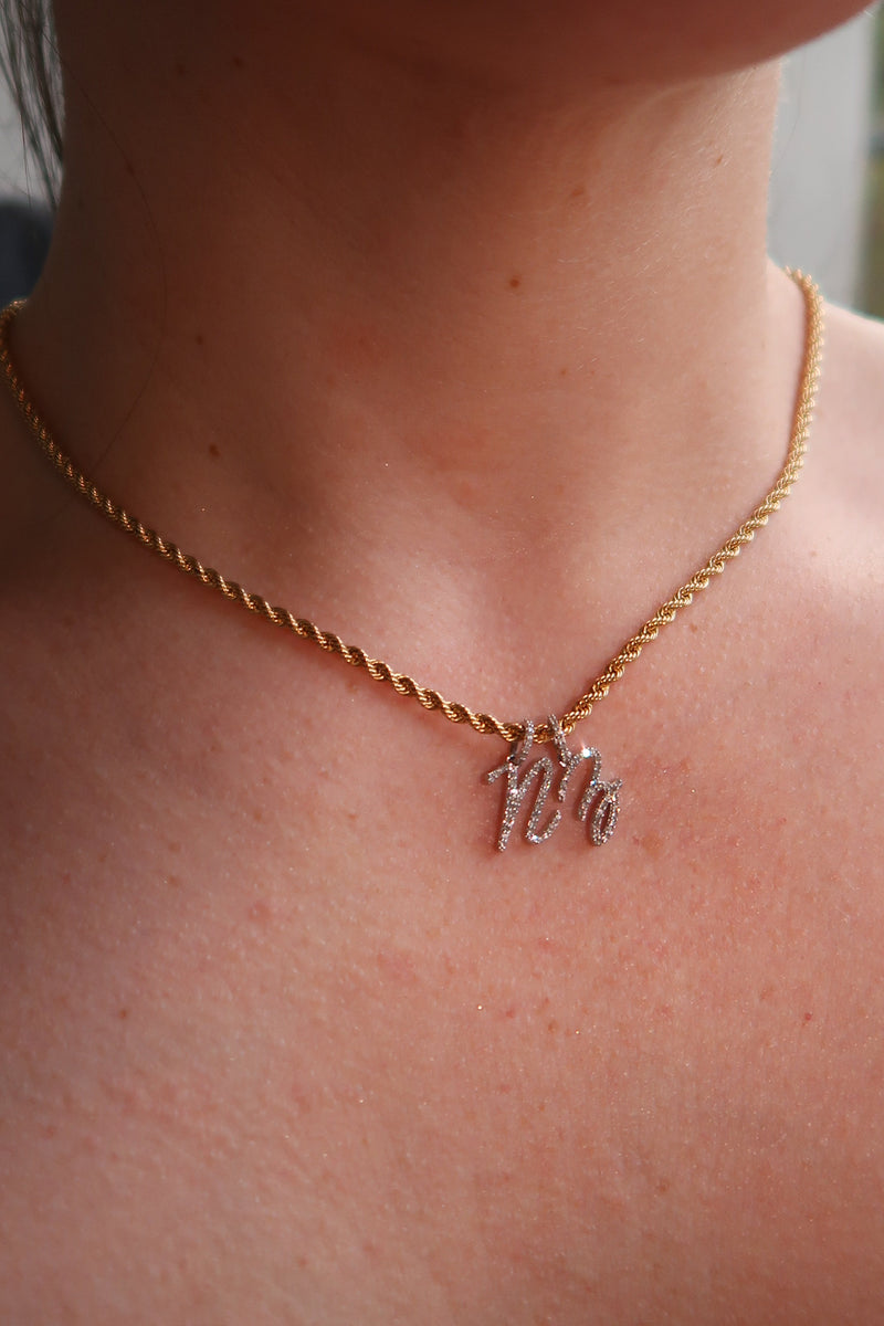 The Cursive Diamond Initial