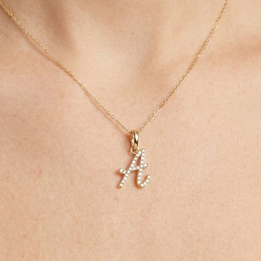 The Cursive Diamond Initial